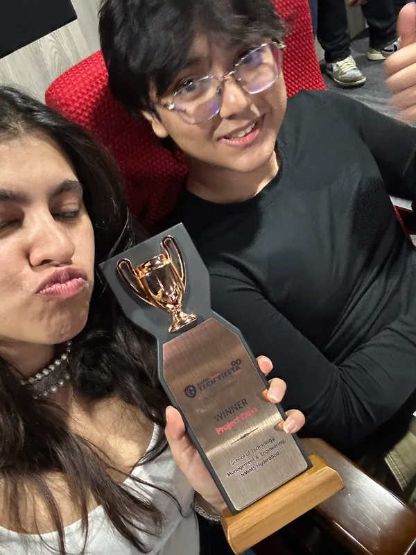 Aditya and a teammate with the Project Expo winner trophy